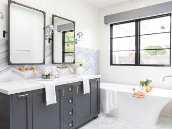 Master Bath With Freestanding Tub and Chevron-Tiled Backsplash