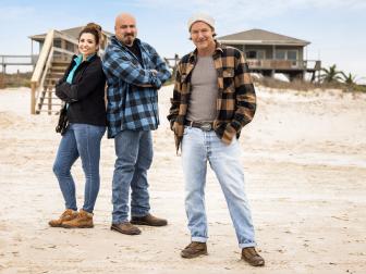 As seen on HGTV's Battle on the Beach Season 2, mentor Ty Pennington poses with his team, Jaqueline and Wally, on the beach.  (Portrait)